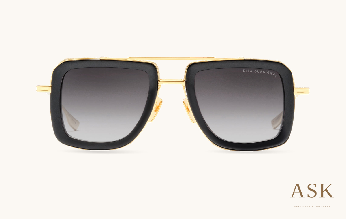 DITA DUBSIGNAL, Yellow Gold - Black / Grey to Clear Gradient, front view on ivory with the ASK logo