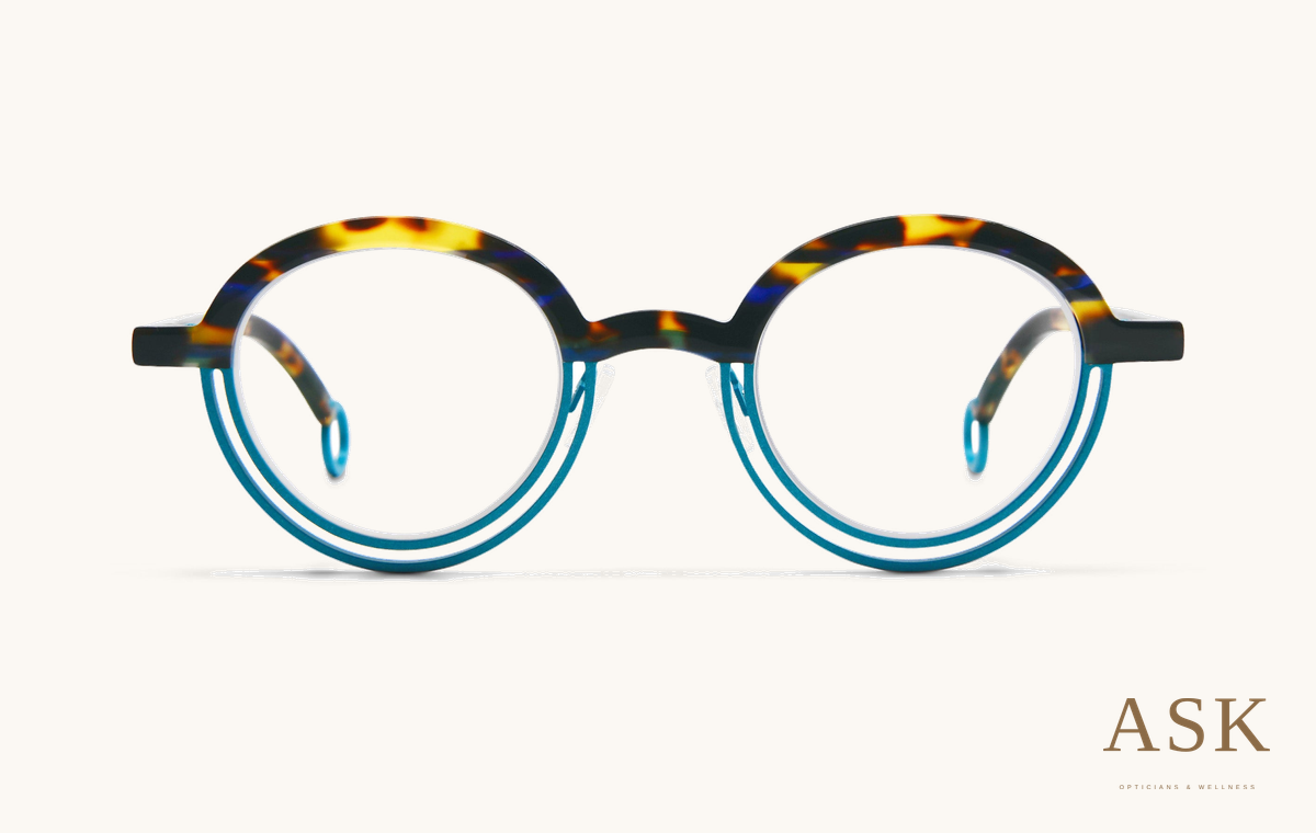 Theo Bumper, Tortoise / Electric Blue / 44-25-140, front view on ivory with the ASK logo