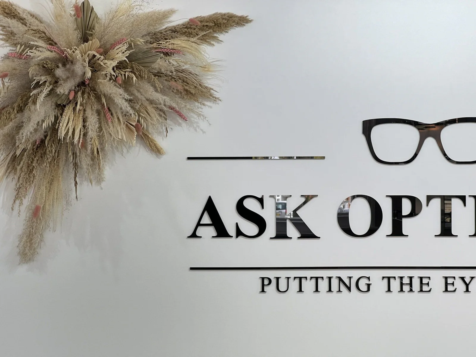 The ASK Opticians sign inside the practice