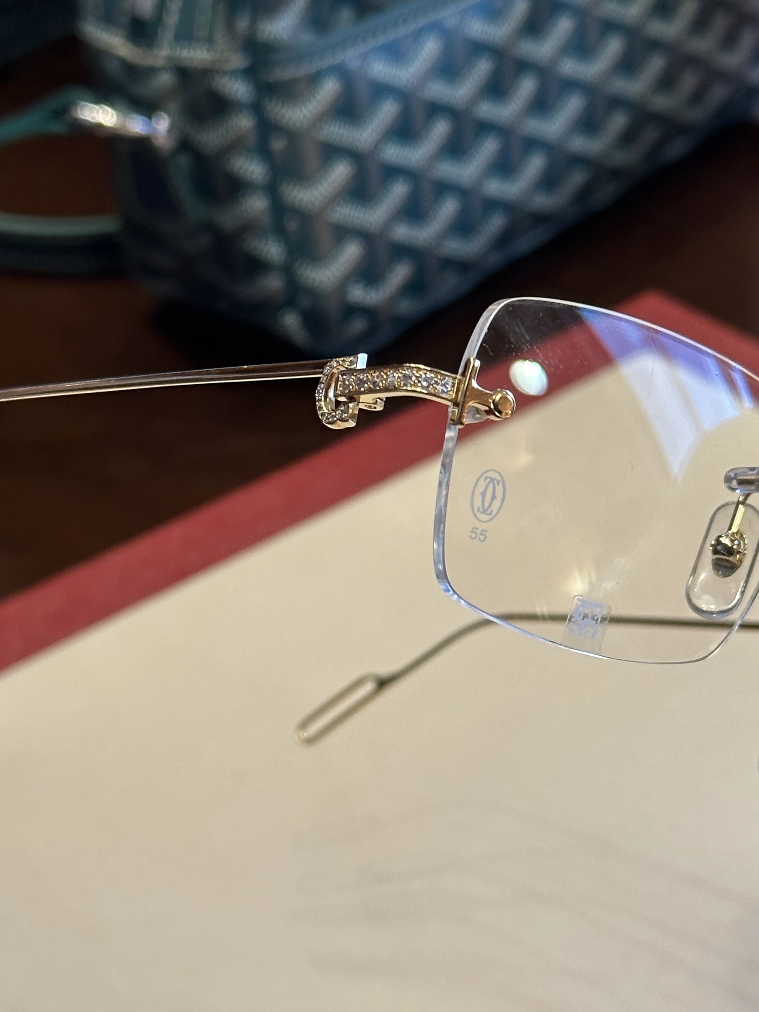 Diamond-set detail on a Cartier Precious rimless frame, photographed by ASK