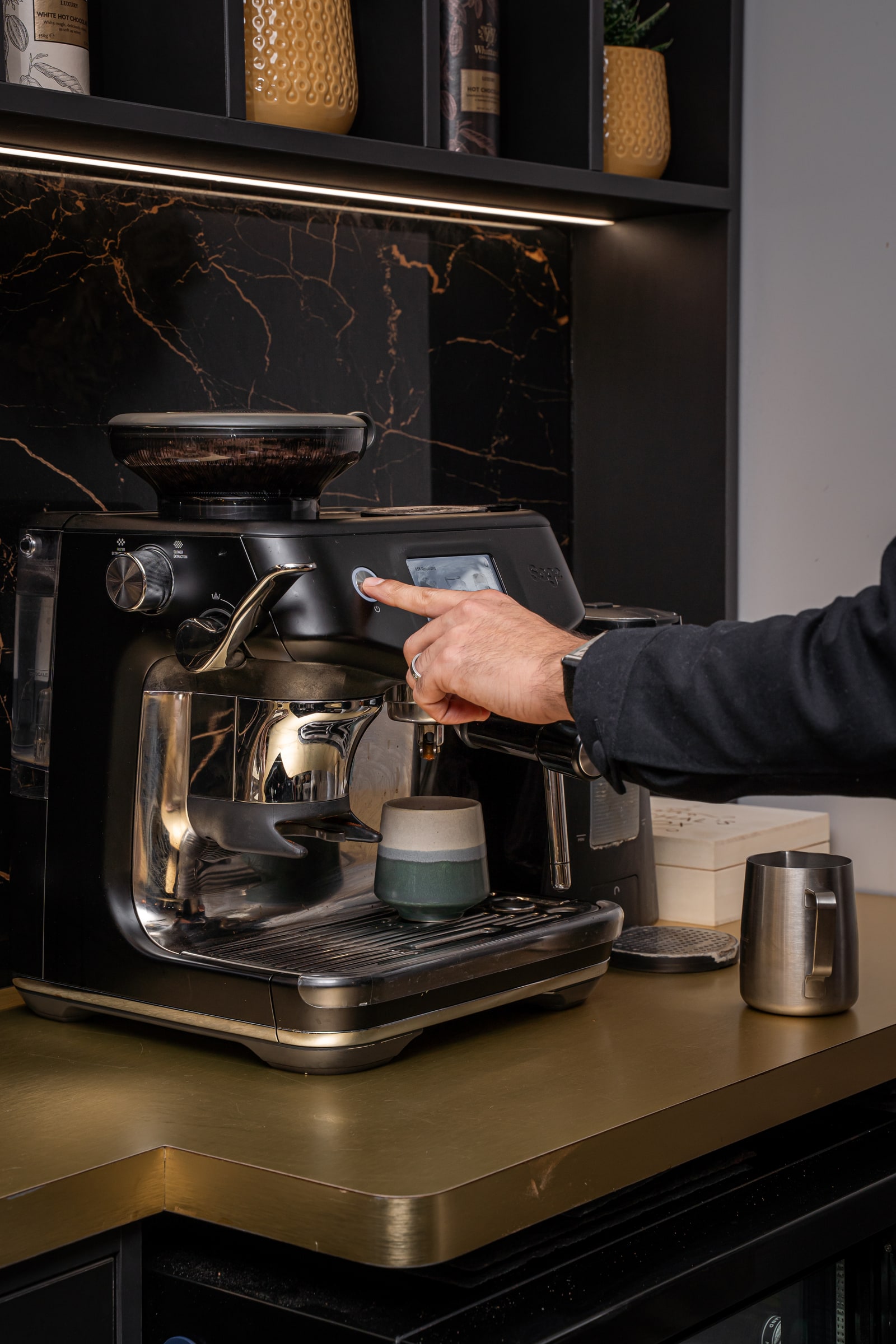 Coffee being prepared with the machine at the ASK Bar