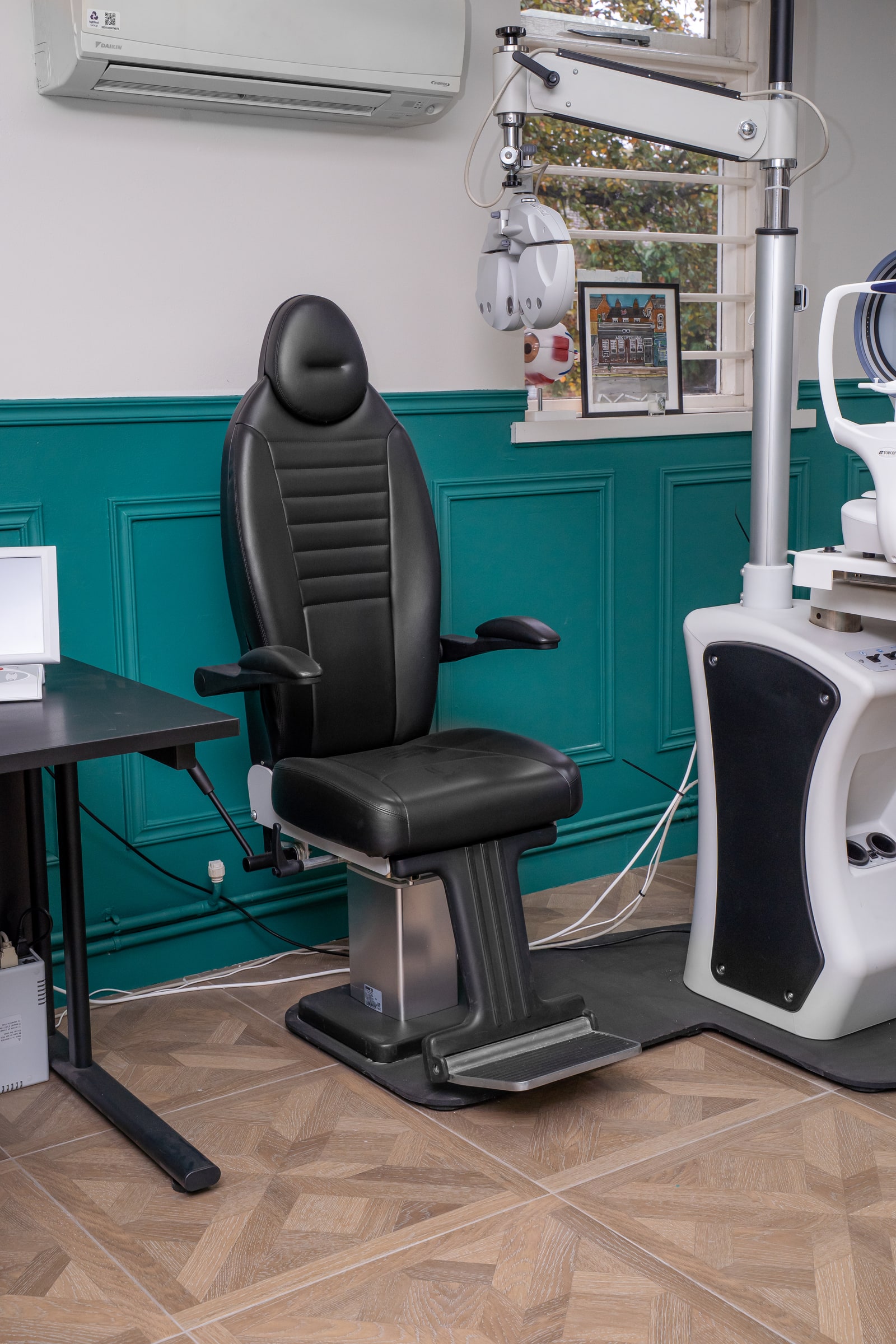 The examination chair in ASK’s green-panelled clinical room