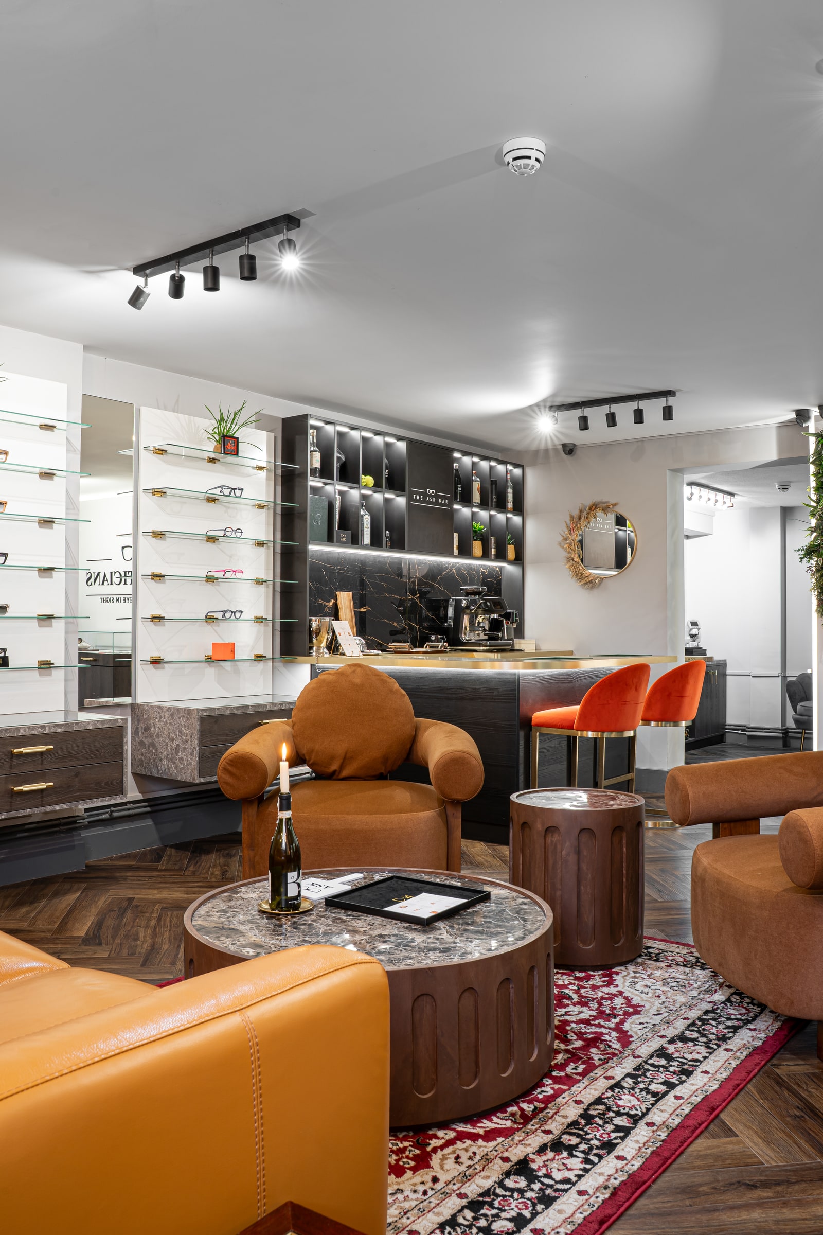 The lounge, frame displays and ASK Bar in the new practice