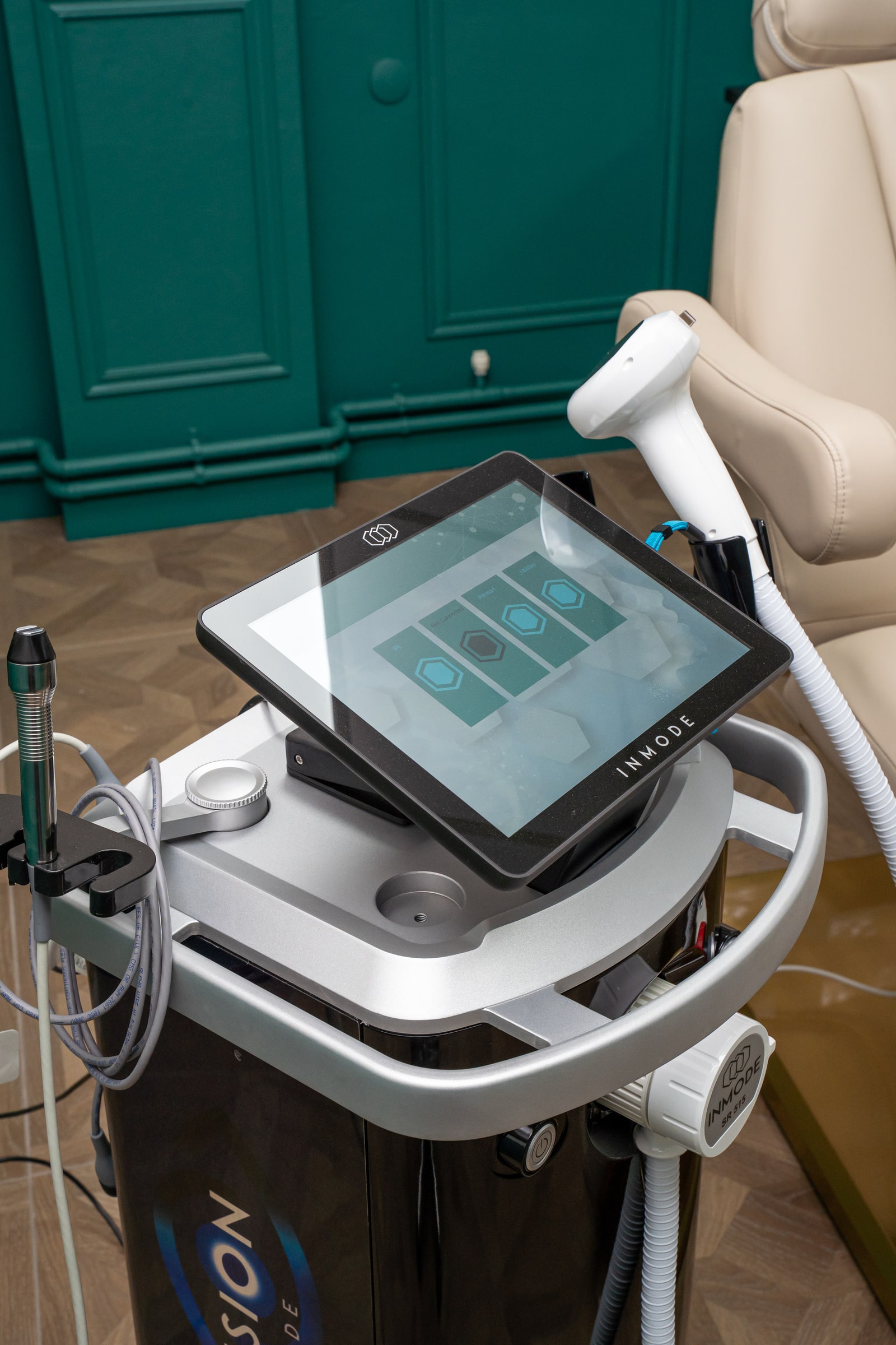 The InMode treatment screen and handpieces at ASK Wellness